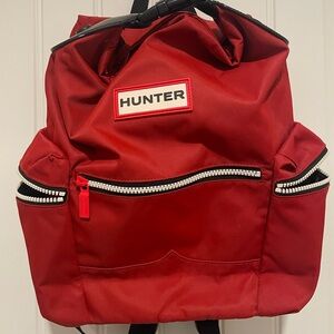 Hunter Red Backpack with Glossy Finish and Striped Detailing